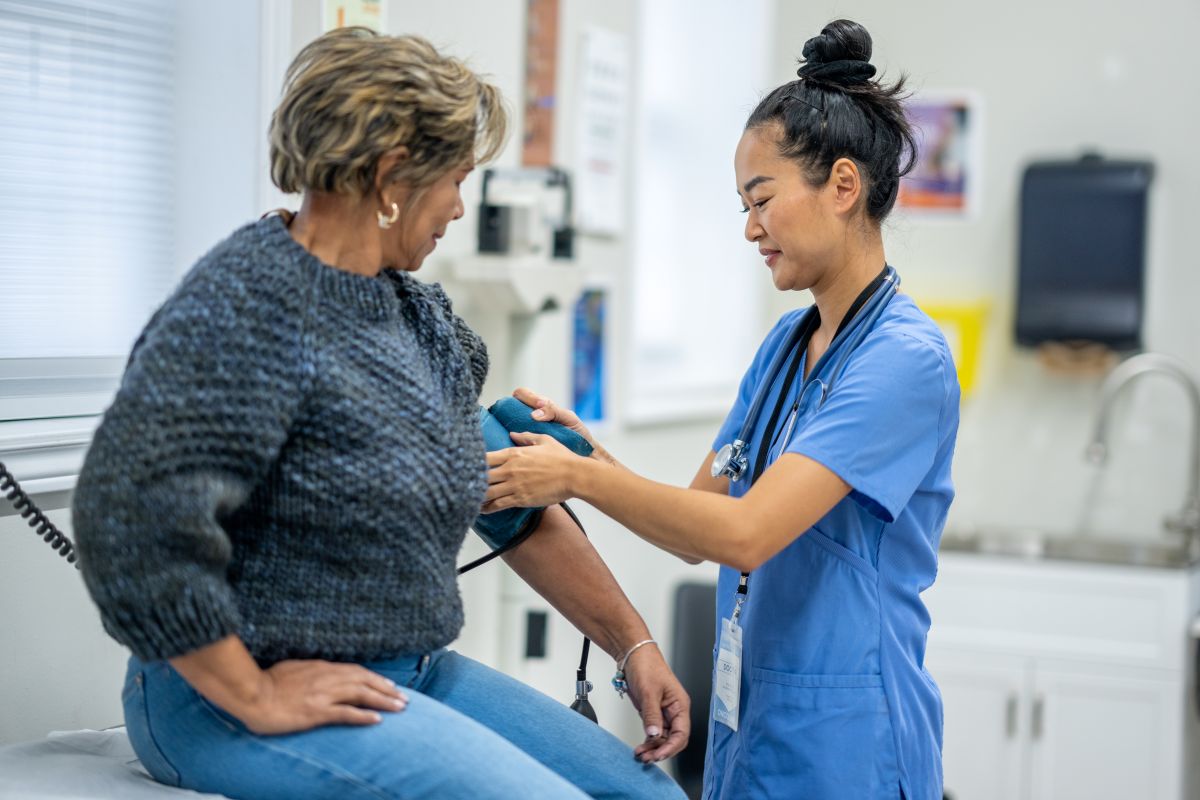 Nurse taking a patient's blood pressure