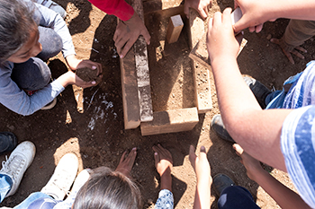 School Children continue to use methods to create their own adobe-like playdoh for hands-on experiences, initially introduced to help children deal with post-traumatic stress of the 2017 Earthquake.