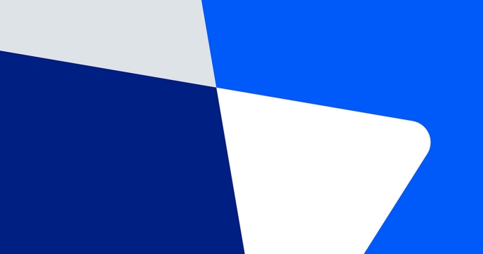Council on Foundations branded pattern with intersecting blue and white triangles on a gray background